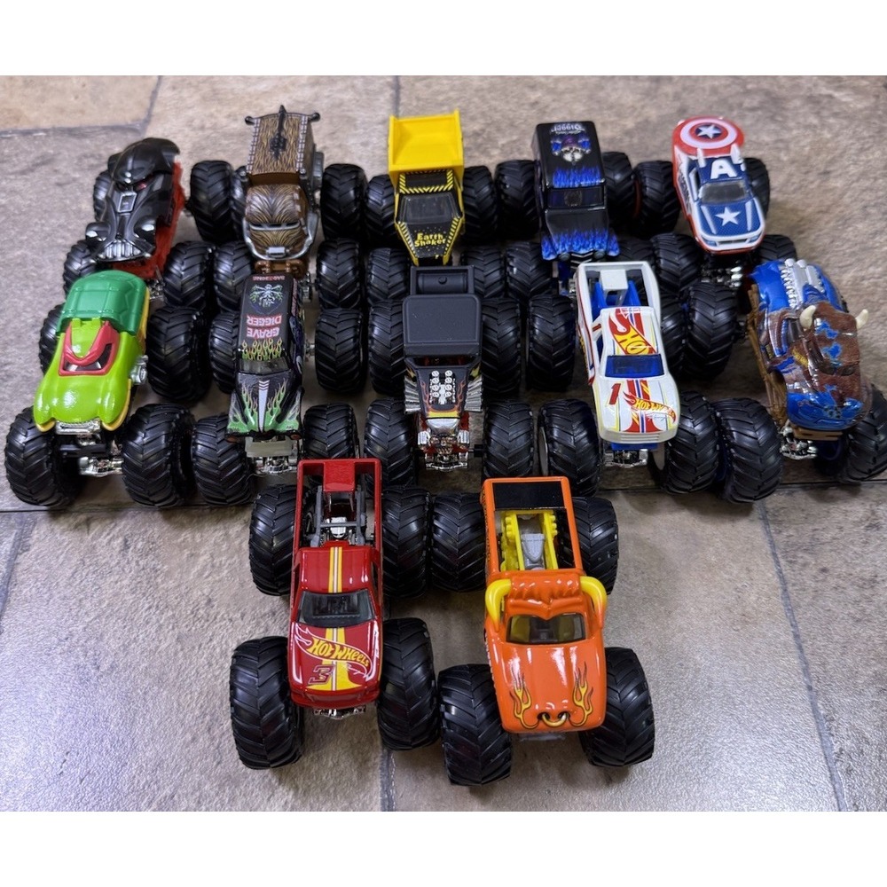 Hot Wheels Monster Trucks Lot Of 12 Grave Digger Captain America Earth Shaker